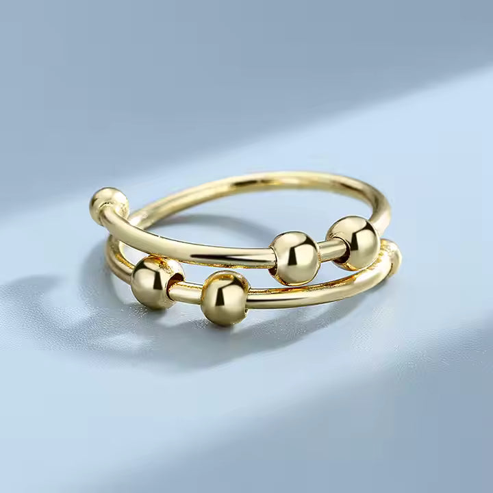 fidget-ring-gold-the-calm-ring.jpg