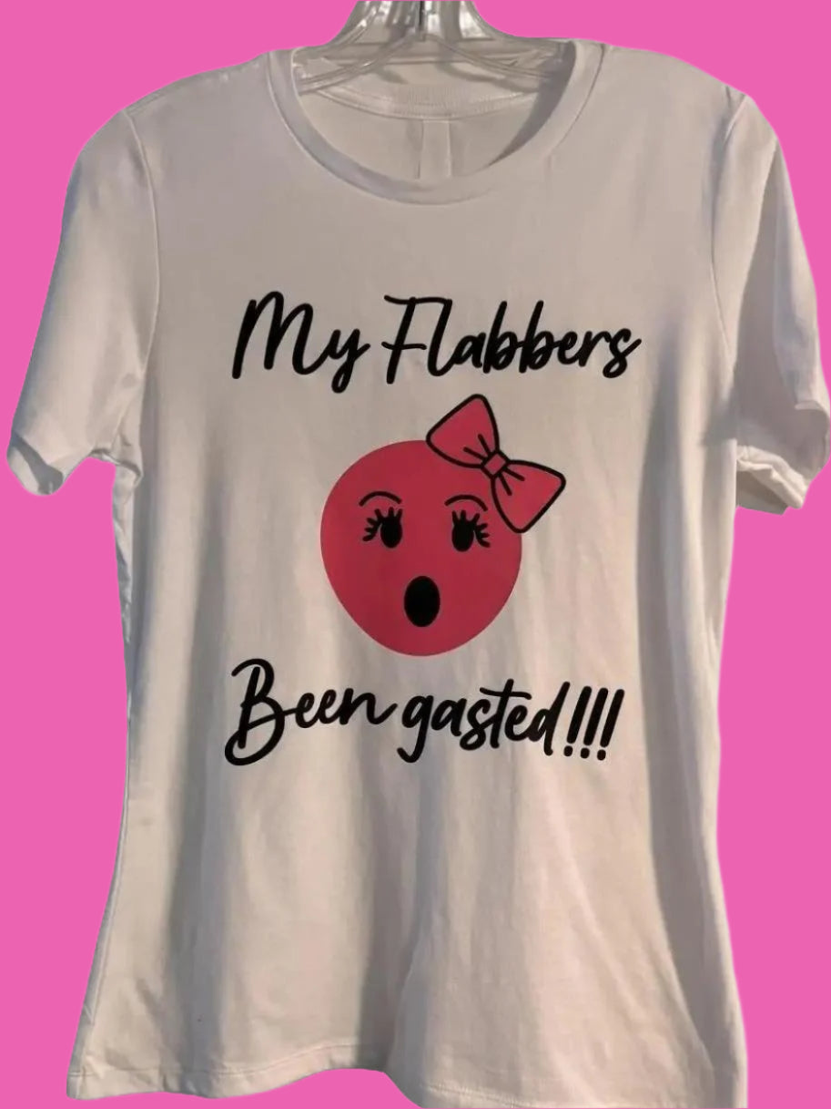 my-flabbers-been-gasted-graphic-pink-emoji-t-shirt-fundraiser-for-tourette-association-of-america-lashes front white tee front view on hanger