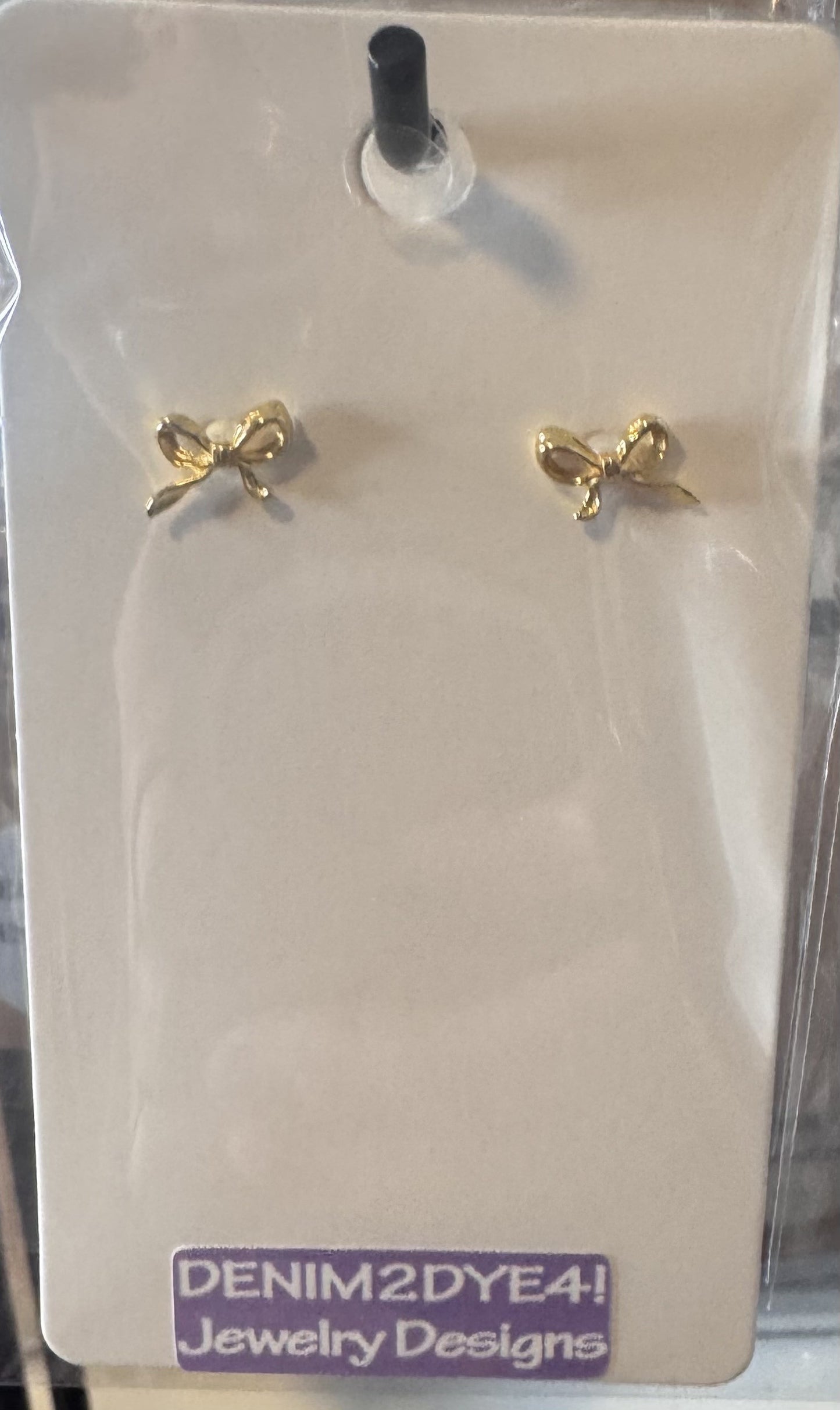 Dainty brass bow stud earrings in gold or silver with silicone backs – hypoallergenic, lightweight, and perfect for gifting
