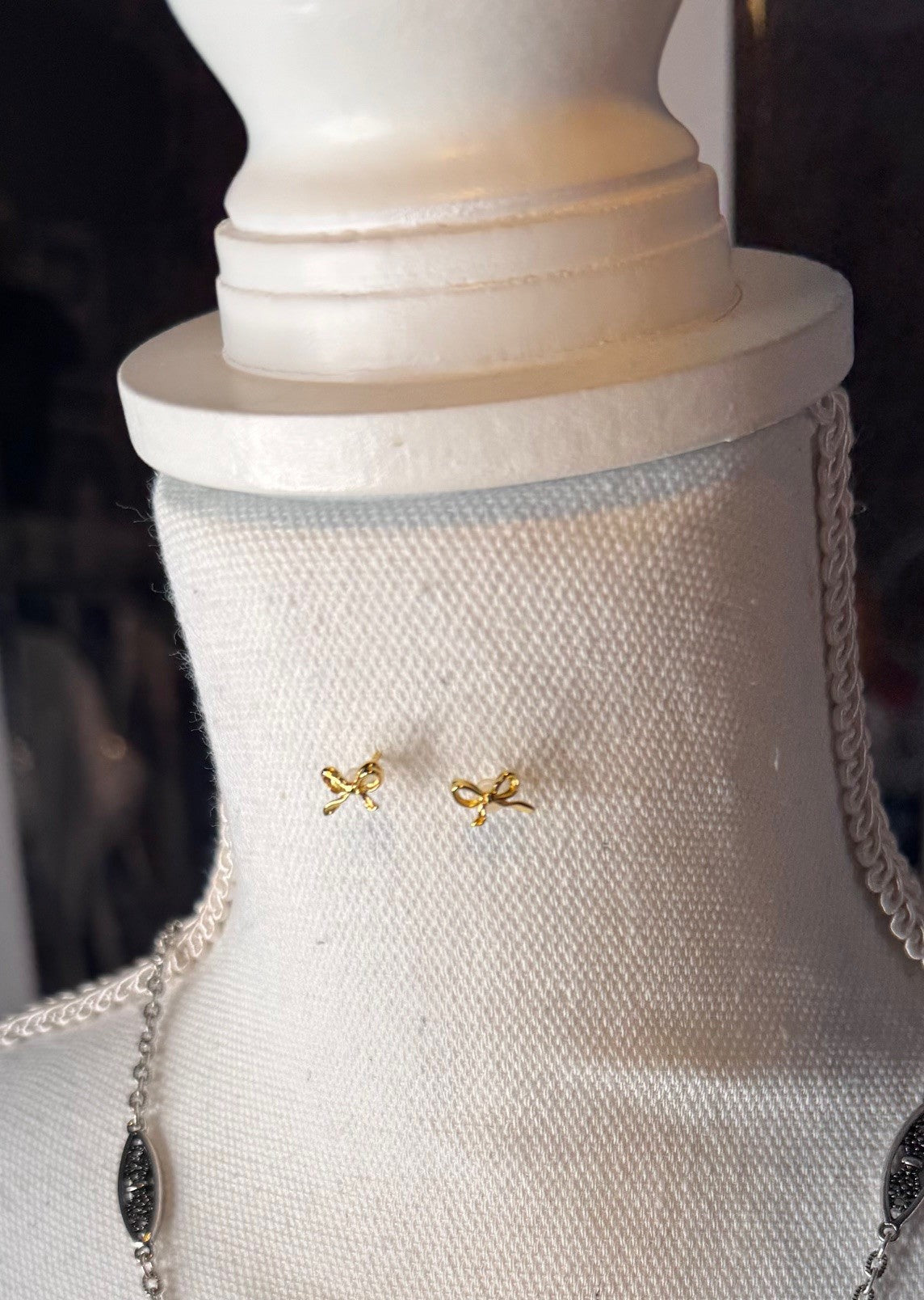 Dainty brass bow stud earrings in gold or silver with silicone backs – hypoallergenic, lightweight, and perfect for gifting
