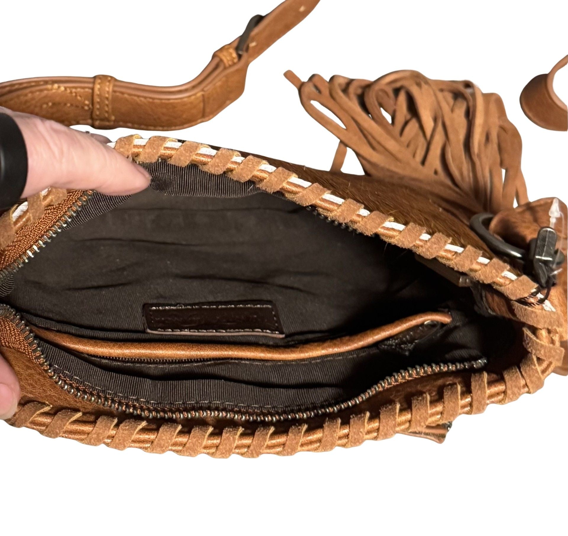 Sierra Fringe Cowhide Crossbody back view zip pocket concealed carry NSIDE