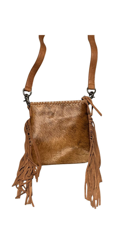 Sierra Fringe Cowhide Crossbody front view brown hair on cowhide
