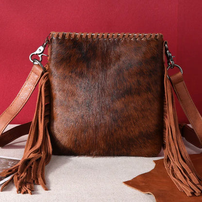 Sierra Fringe Cowhide Crossbody strap detail adjustable leather strap