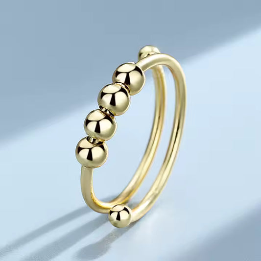 fidget-ring-gold-the-calm-ring.jpg