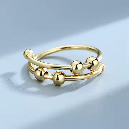 fidget-ring-gold-the-calm-ring.jpg