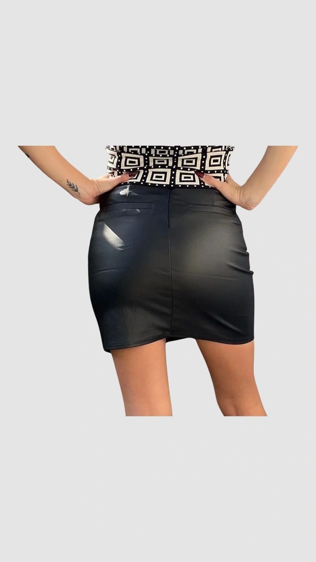 The Millenium Black Coated Mini Skirt with Side Slit and Back Zipper