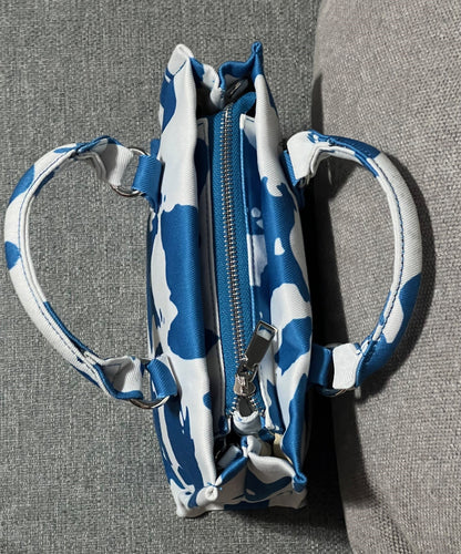 MOO-VE IT PURSE WITH HANDLES AND LINKED CROSS BODY STRAP BLACK,, BLUE OR BROWN