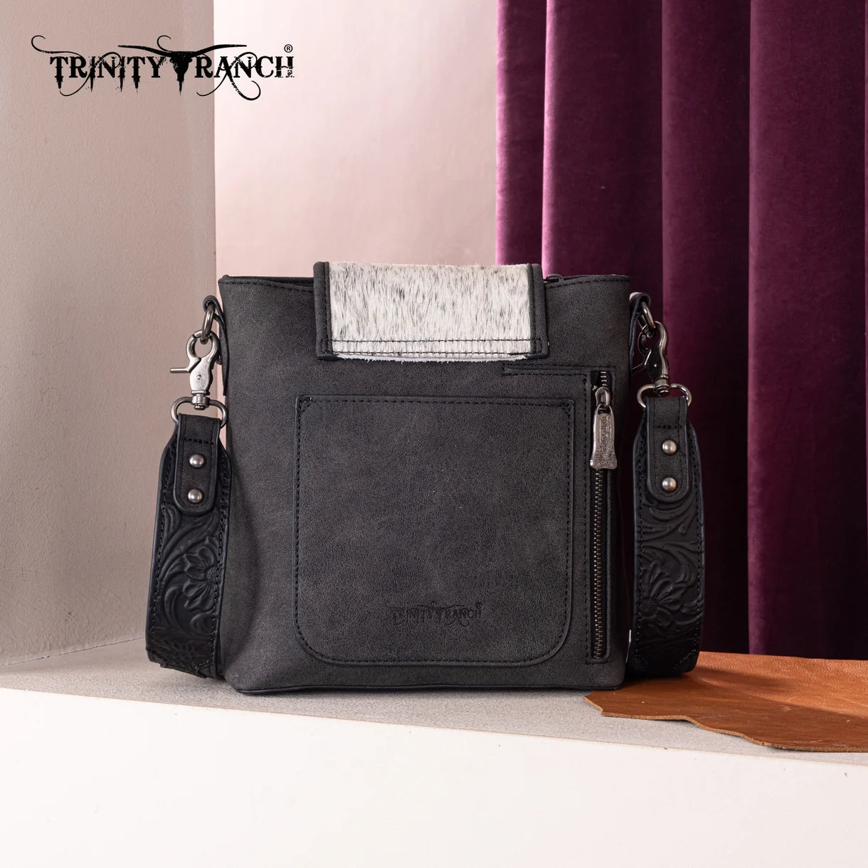Genuine hair-on cowhide pattern on Trinity Creek Western crossbody purse back view