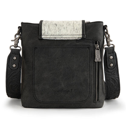 Trinity Creek  cowhide crossbody with floral tooling and studs