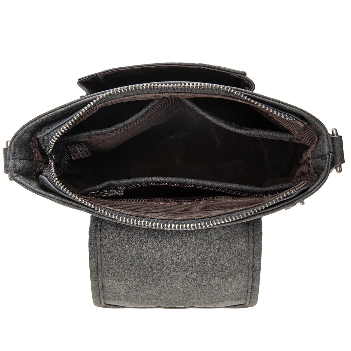 Trinity Creek floral tooled cowhide bag with studded crossbody strap inside. 