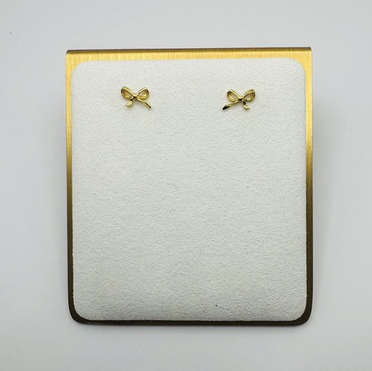 Dainty brass bow stud earrings in gold or silver with silicone backs – hypoallergenic, lightweight, and perfect for gifting
