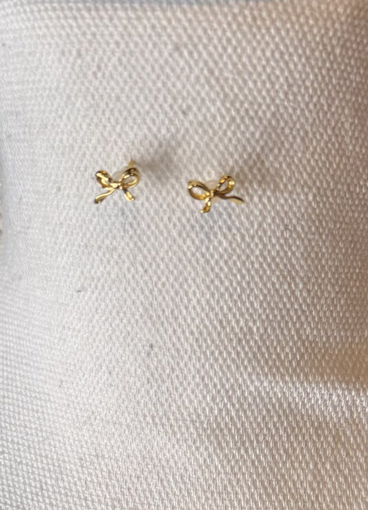 Dainty brass bow stud earrings in gold or silver with silicone backs – hypoallergenic, lightweight, and perfect for gifting