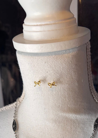 Dainty brass bow stud earrings in gold or silver with silicone backs – hypoallergenic, lightweight, and perfect for gifting 