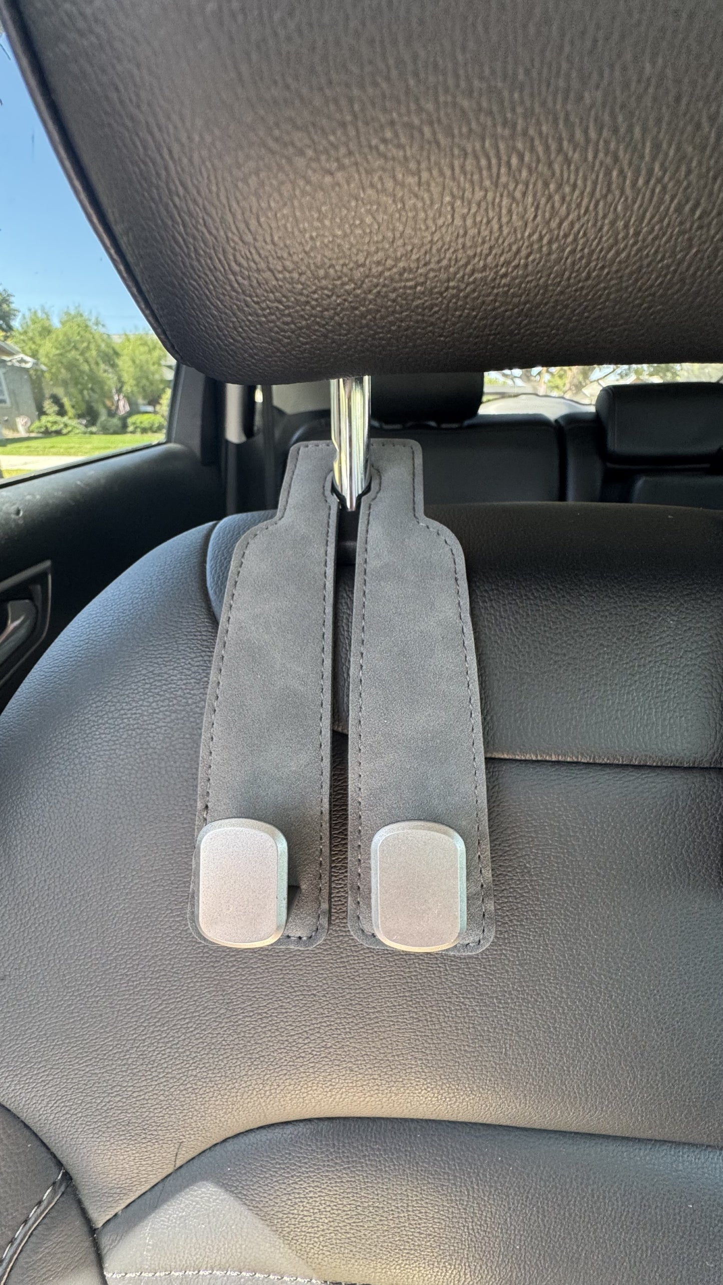 Purse perch keeps your handbag from slamming on the grand when you slam on the breaks. no mess. 
